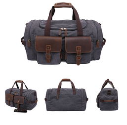 源點(diǎn)帆布旅行包復(fù)古男士手提包休閑耐磨單肩斜跨行李包廠家直銷